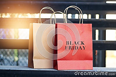 Black friday word on red and brown paper shopping bags Stock Photo