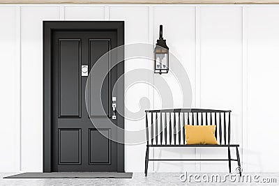 Black front door of white house with bench Stock Photo