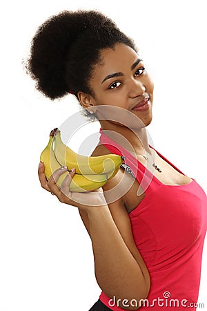 Black girl holds bananas in hand Stock Photo