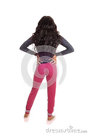 Black girl in pink tights from back. Stock Photo