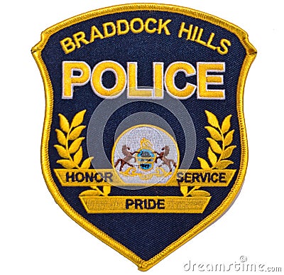 A black and gold BRADDOCK HILLS POLICE shoulder patch on a white background Stock Photo