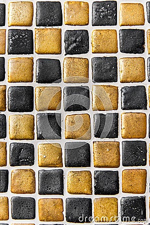 Black & Gold Ceramic Tile Background Pattern / Texture Stock Photo