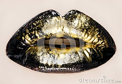 Black and gold lips close up Stock Photo