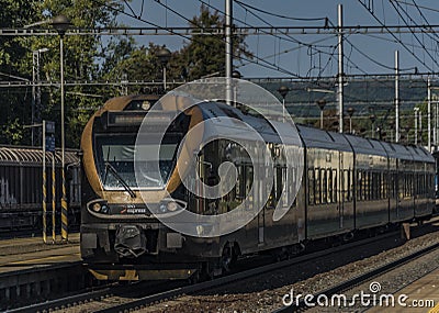 Black gold train in Zabreh station in summer day Editorial Stock Photo
