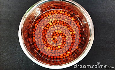 black grams are soaking in water closeup image Stock Photo