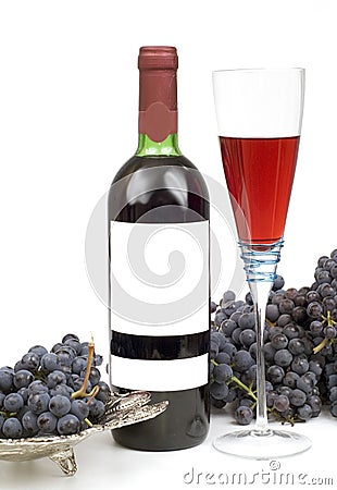 Black grape and bottleful wine Stock Photo