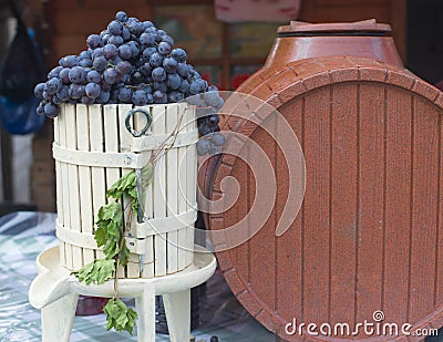 Black grape and brown cask Stock Photo