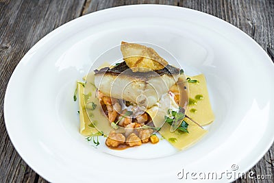 Black hake, prawns ragout and fresh pasta Stock Photo