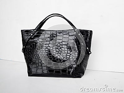 Black handmade womens shopper bag, patent leather bag made of crocodile eco leather, patent leather accessory Stock Photo