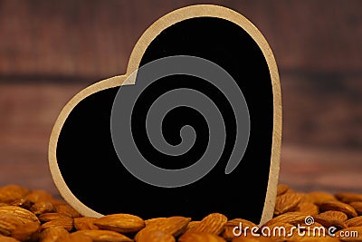 Heart symbol with almonds. Stock Photo