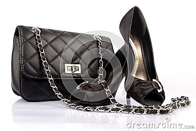 Black high heel women shoes and a bag Stock Photo