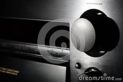 Black home theater amplifier with volume knob clos Stock Photo