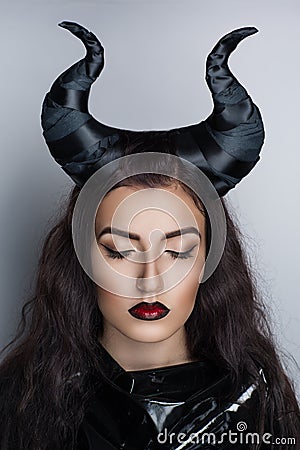 https://thumbs.dreamstime.com/x/black-horns-maleficent-portrait-beautiful-young-elegant-woman-girl-lady-actress-model-wealth-luxury-perfect-makeup-beautiful-68610625.jpg