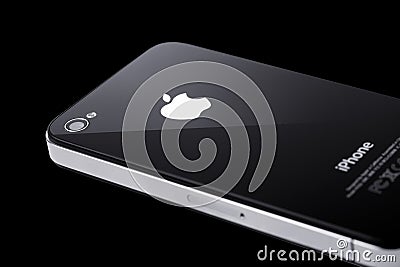 Black iPhone 4s on black background Editorial Stock Photo