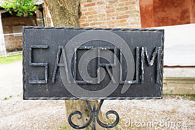 Black iron rectangualar sacrum sign Stock Photo