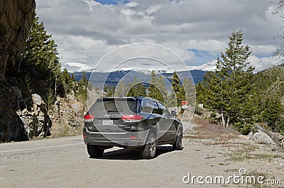 Black Jeep Gran Cherokee in the outdoors Editorial Stock Photo