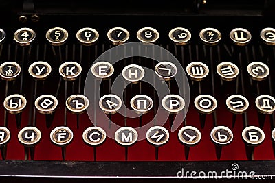 Black keyboard is vintage of a russian mechanical typewriter closeup Stock Photo