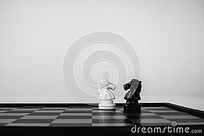 Black knight and White knight stand face to face. Business competition. competitiveness and strategy Stock Photo