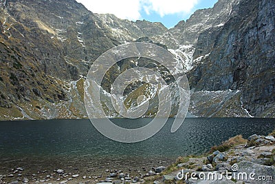 Black Lake below Mount Rysy, the Fish Brook Valley/Poland. Editorial Stock Photo