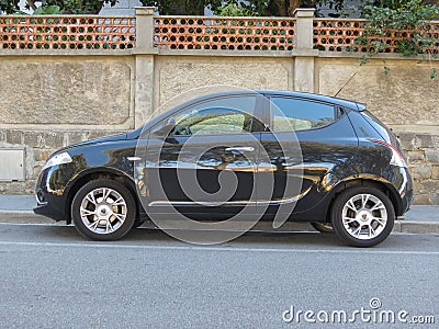 Black Lancia Ypsilon car in Cagliari Editorial Stock Photo