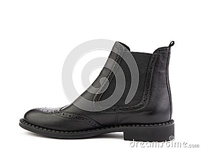 black leather chelsea boots with black elasticated side details, pattern details and black rubber sole. Isolated close Stock Photo