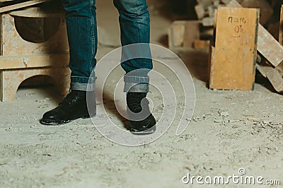 Black leather men`s shoes stylish and classic jeans Stock Photo