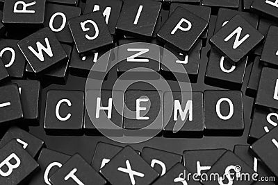 Black letter tiles spelling the word & x22;chemo& x22; Stock Photo