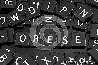 Black letter tiles spelling the word & x22;obese& x22; Stock Photo