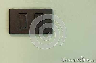 Light Switch on Concrete Wall Stock Photo