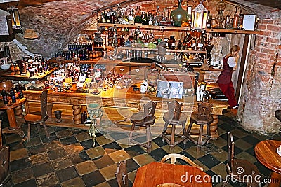 Black magic bar interior in the historical center of Old town, Riga Editorial Stock Photo