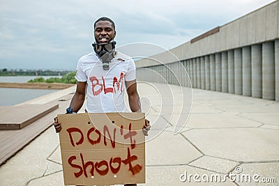 Black man protest against injustice, blm concept Editorial Stock Photo