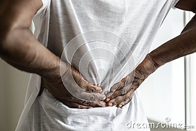 Black man suffering back pain Stock Photo