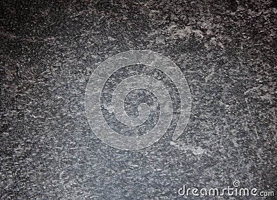 Black marble with white veins and splashes, intense close-up of polished stone Stock Photo