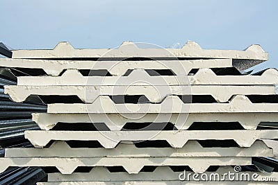 Black metal sheet roof with insulation attached under metal sheet. Stock Photo