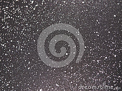 Black metal texture with small white dots Stock Photo