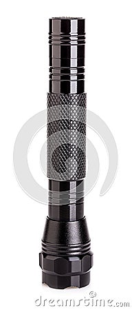 Black metallic flashlight close-up isolated on a white background Stock Photo