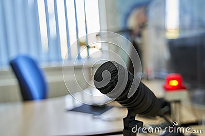 Black Microphone OnAir in Radio Studio Stock Photo