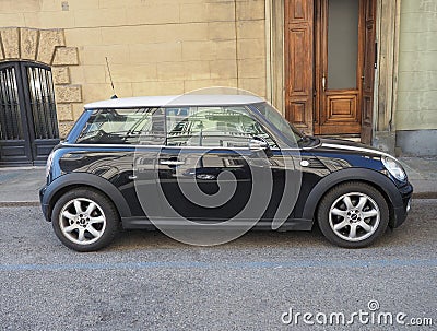 black Mini cooper car in Turin Editorial Stock Photo