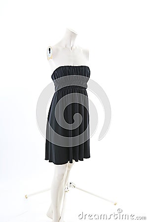 Black mini dress on Headless Mannequin Cloth Display Dressmaker doll figurine. Fashion designer clothes. Stock Photo