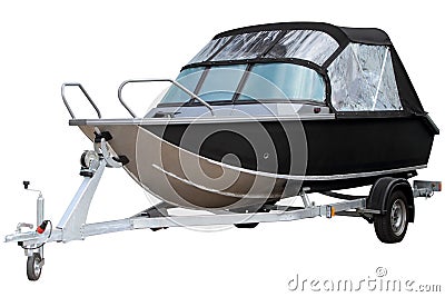 Black motor boat with an awning. Stock Photo