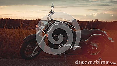 Black motorcycle on the roadside Stock Photo