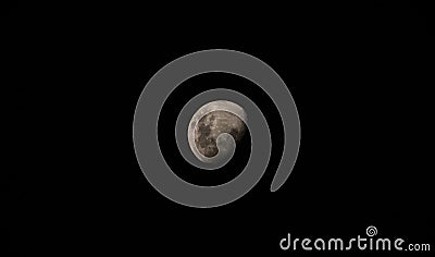 Black night sky closeup view of bright side of the moon sphere planet star from Huacachina desert Peru South America Stock Photo