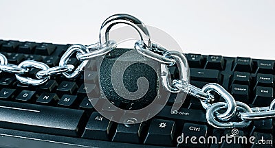 Cyber attack threat secured, chained computer keyboard Stock Photo