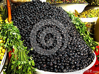 Black olives for sale at a Moroccan Souk Stock Photo