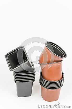 Black and orange square and round flower pots Stock Photo