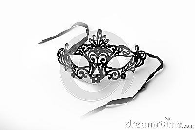 Black Ornate Masquerade Mask on White Background Stock Photo