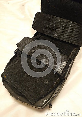 A black Orthopedic or medical boot, cast or footwear Stock Photo