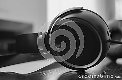 Black pair of headphones close-up, black and white images Stock Photo