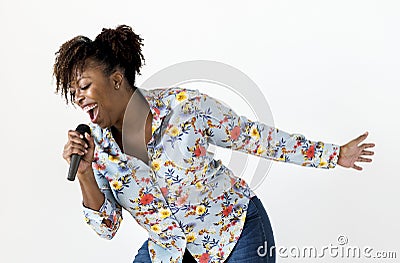 Black passionate woman vocalist singing karaoke Stock Photo