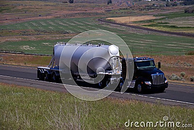 Black Peterbilt / Tanker Trailer Stock Photo